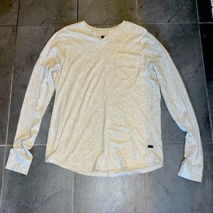 Large White Goodman Brand Long-sleeve T-shirt. Slight V-neck